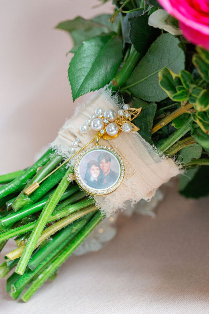 bridal flatlay memorial photo on bouquet 